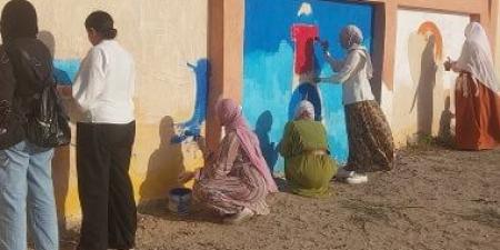 "بالرسم هنجمل بلدنا".. مشاركة شباب عزبة البرج فى تطوير شوارع دمياط