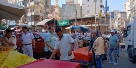 حملة مكبرة لرفع إشغالات شارع النصر وسوق راتب فى الإسكندرية